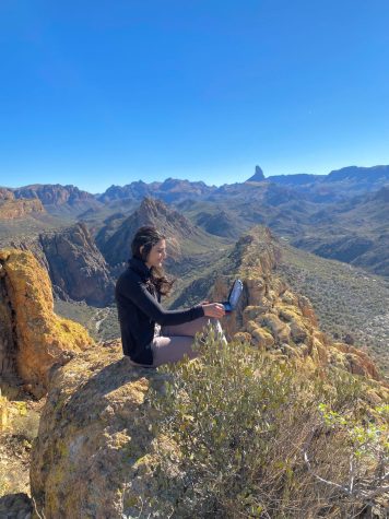 Mrs. Elliot playing Battleship on Battleship Mountain. Every year on New Year’s Day Mrs Elliot spends her day doing a 13-mile hike deep within the Superstitions to summit Battleship Mountain. 