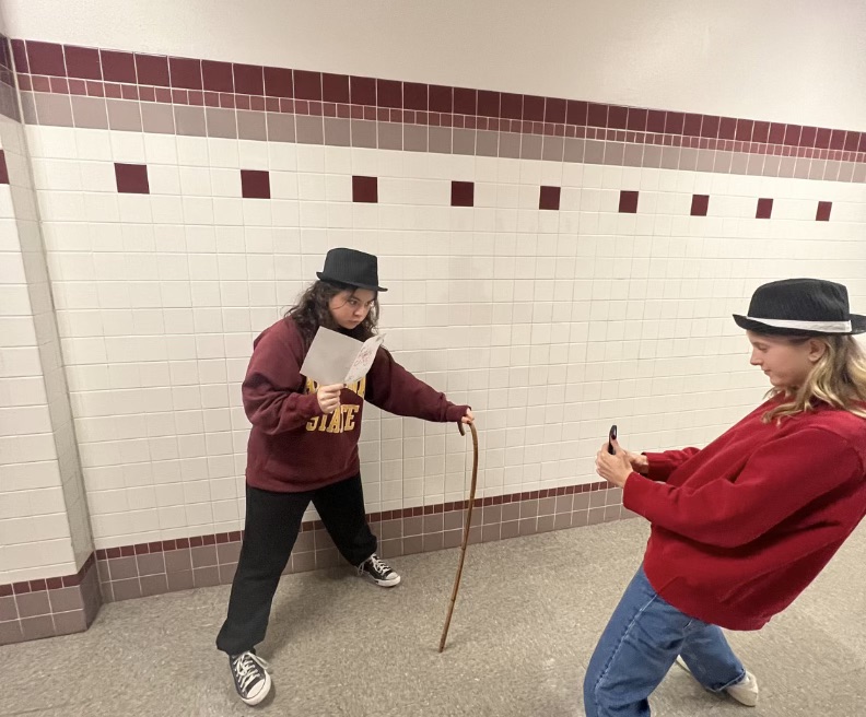 HALLWAY SHENANIGANS: Students Ellie Nabavi (10) and Zya Bonnenfant (10) are bringing their characters to life for their creative writing assignment. When asked about the assignment Nabavi said, “yes, it was super fun because i enjoy writing and the opportunity to write a novel in that short of time.” The patience and grit of both students is astounding to say the least. 